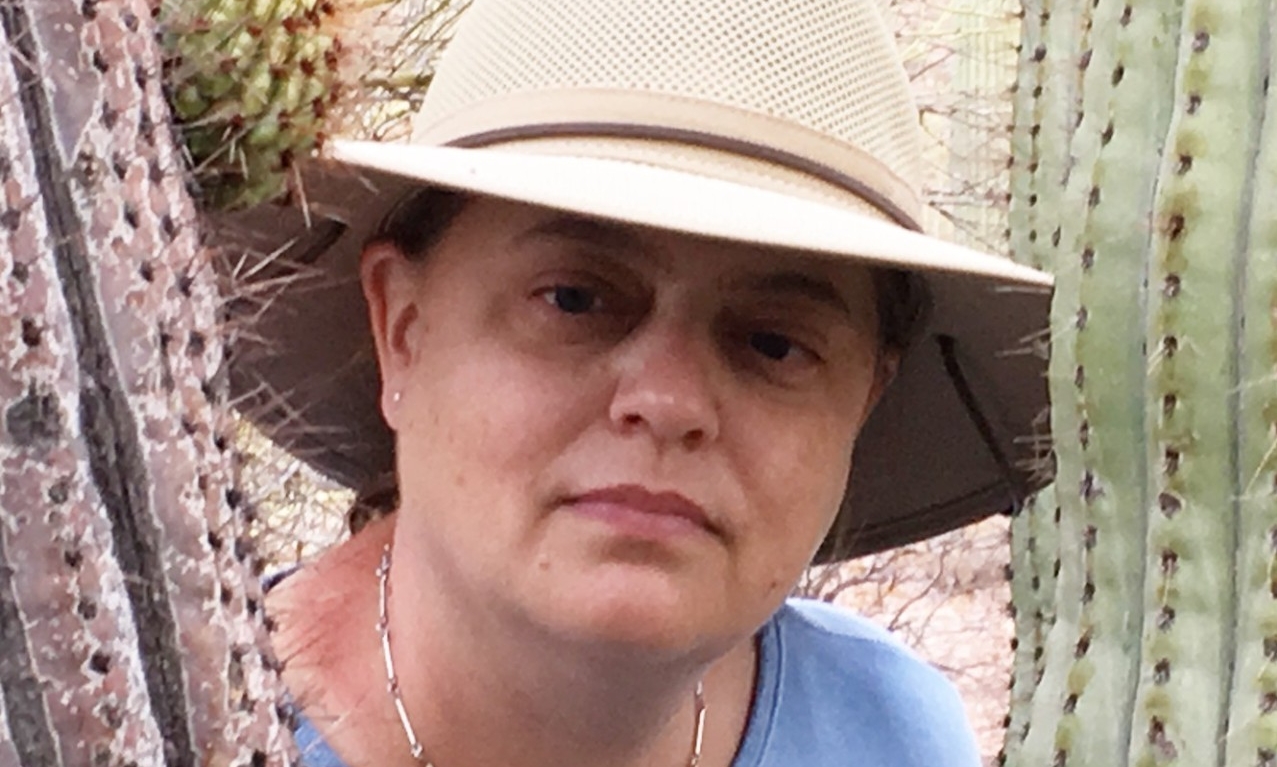 Prof. Rollmann in the desert with cactus