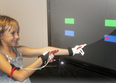 CCRL researcher working with a child