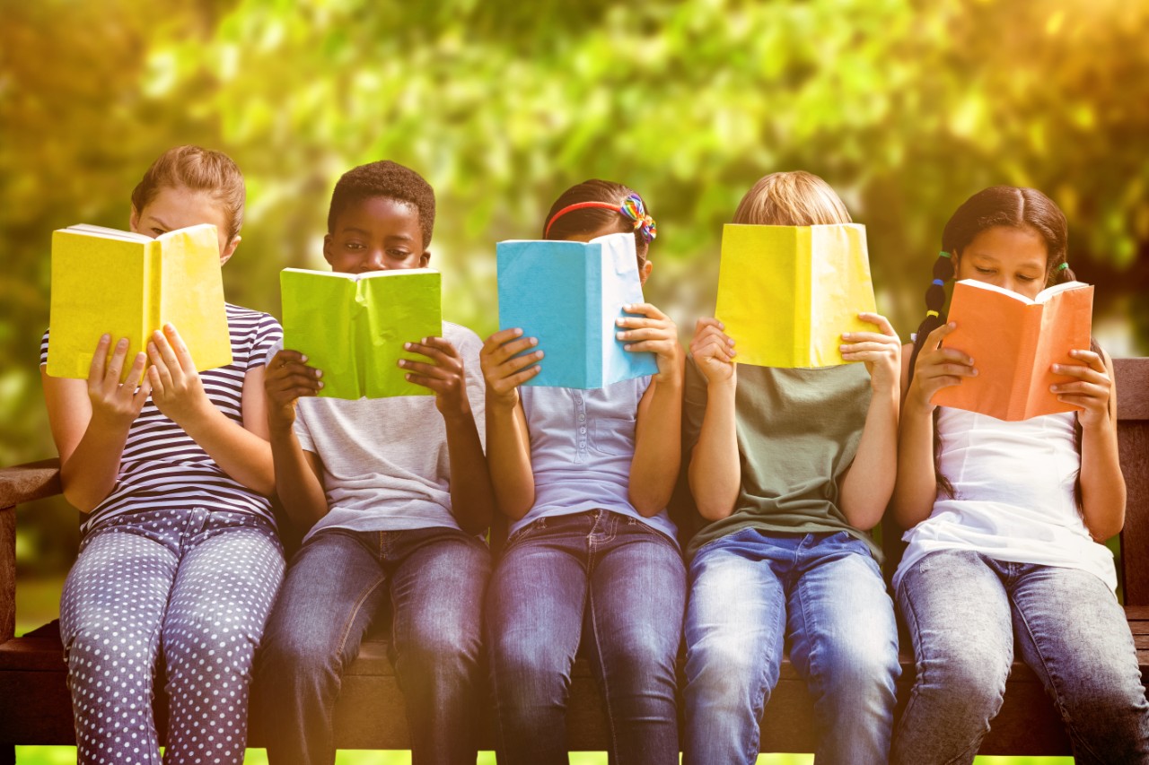 Line of kids reading books